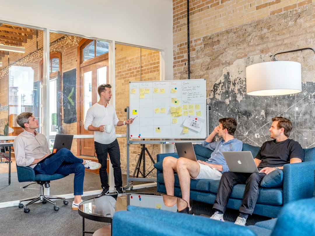 Team planning workload on a whiteboard
