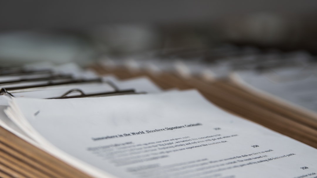 Stacks of compliance report documents