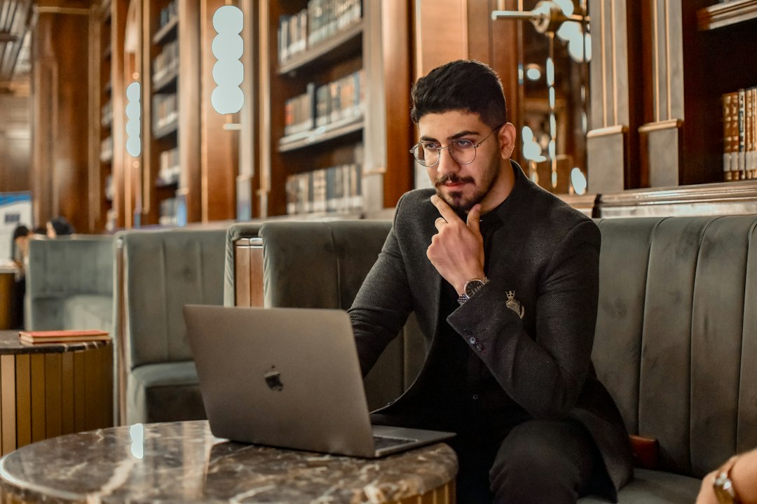 Hotel manager working on a laptop